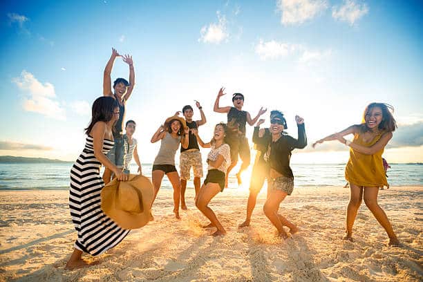 Happy young people on beach
